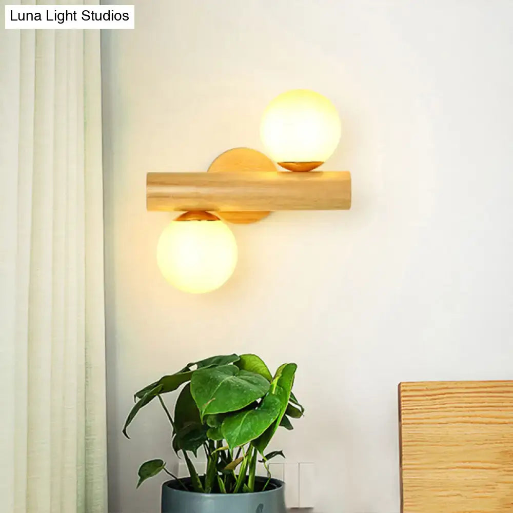 Contemporary white milk glass wall lamp with wooden base for bathroom