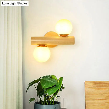 Contemporary white milk glass wall lamp with wooden base for bathroom