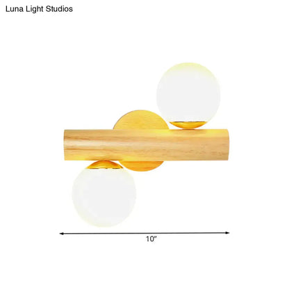 Contemporary white milk glass wall lamp with wooden base for bathroom