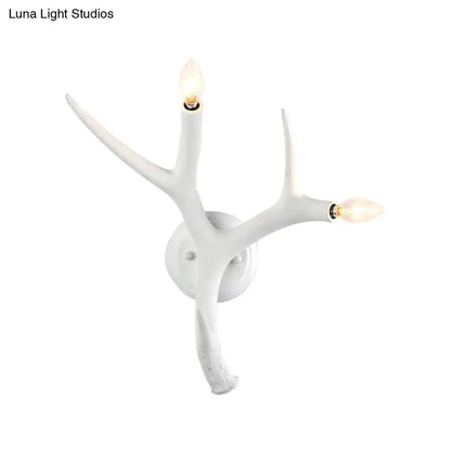 Contemporary white resin antler wall sconce for restaurant dining room