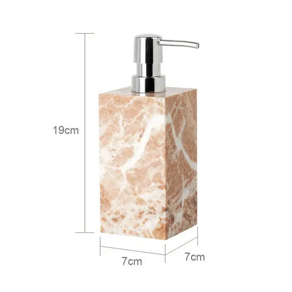 Coral pink marble bathroom accessories set with gold accents