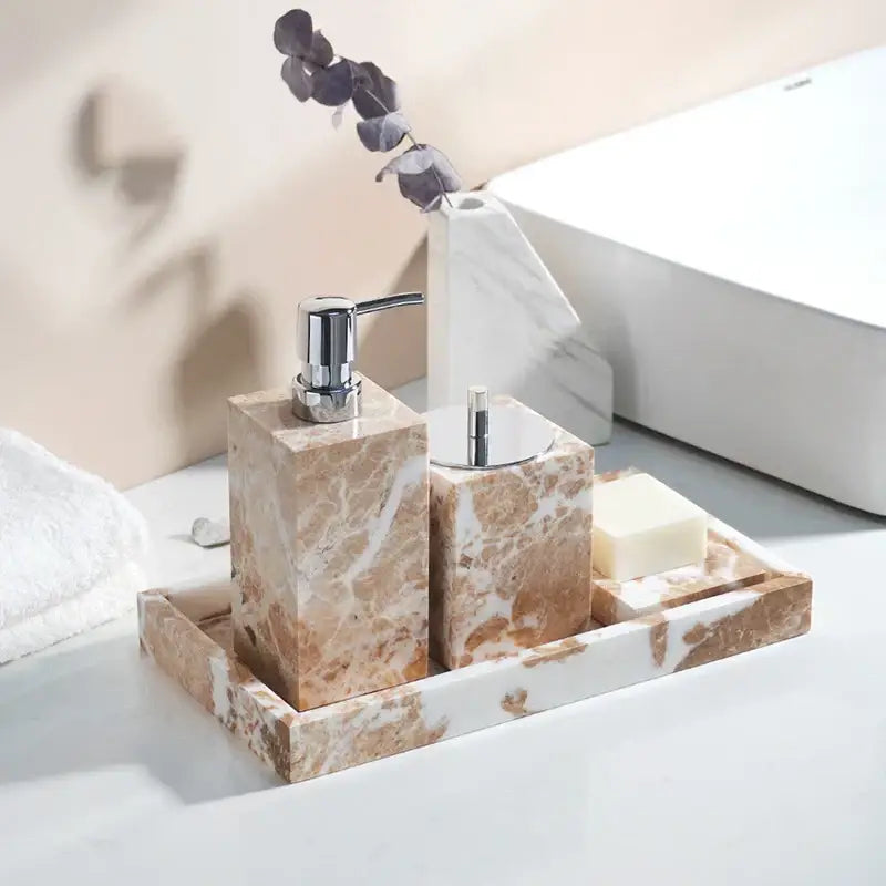 Coral pink marble bathroom accessories set with gold accents