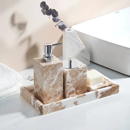 Coral pink marble bathroom accessories set with gold accents