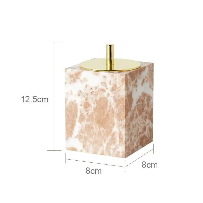 Coral pink marble bathroom accessories set with gold accents
