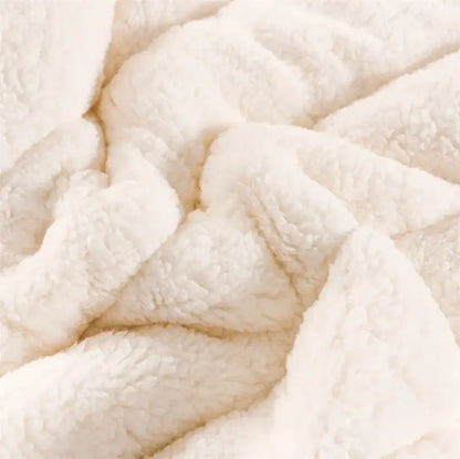 Cozy coral fleece blue and white quilted blanket for bedroom