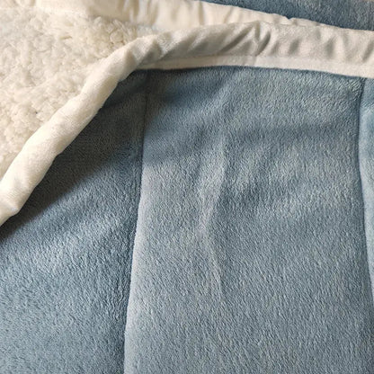 Cozy coral fleece blue and white quilted blanket for bedroom