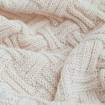 Cozy fringed plaid cream knit throw blanket bedroom decor
