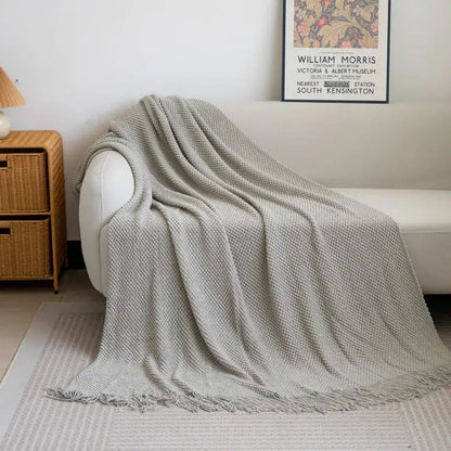 Cozy knitted sofa blanket with tassels – living room textured throw