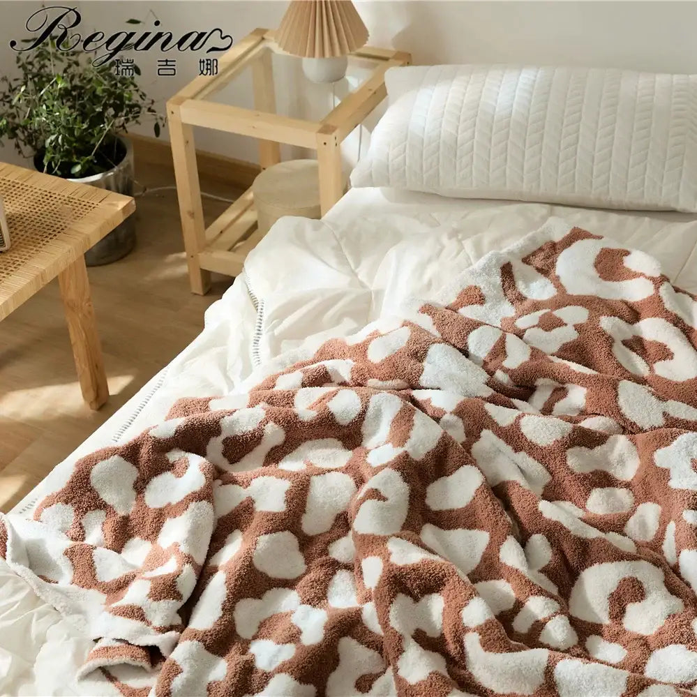 Cozy leopard print knitted cream & gray bedroom throw blanket