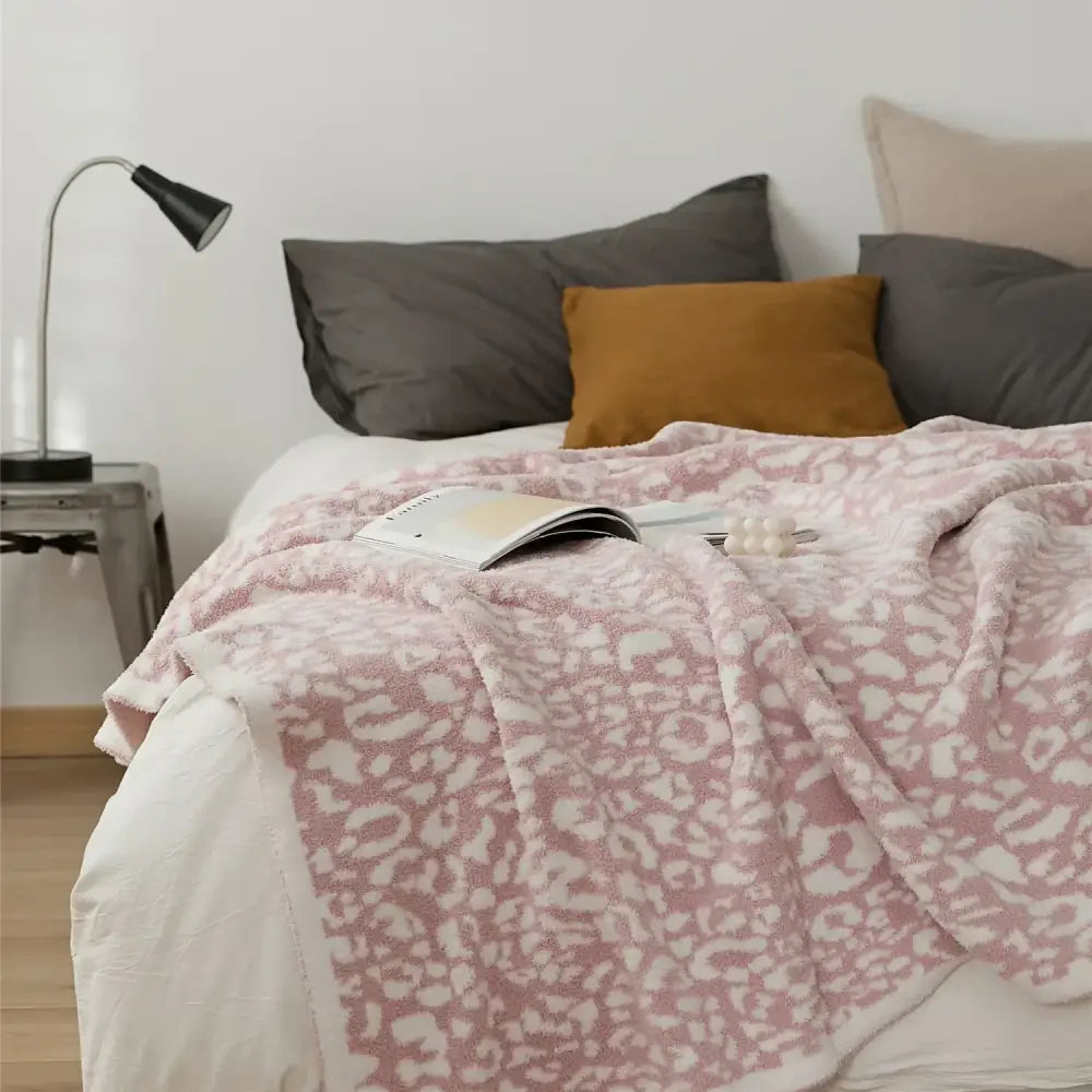 Cozy leopard print knitted cream & gray bedroom throw blanket