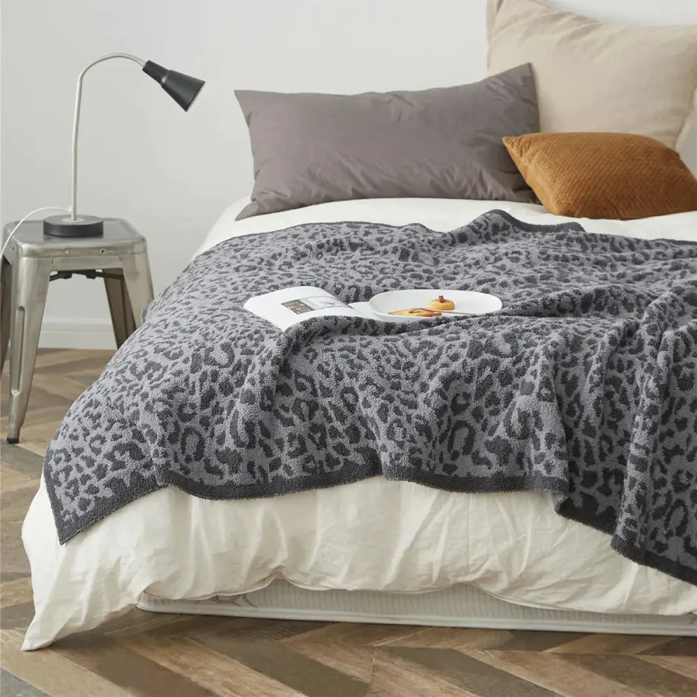Cozy leopard print knitted cream & gray bedroom throw blanket
