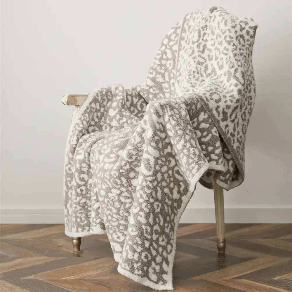 Cozy leopard print knitted cream & gray bedroom throw blanket