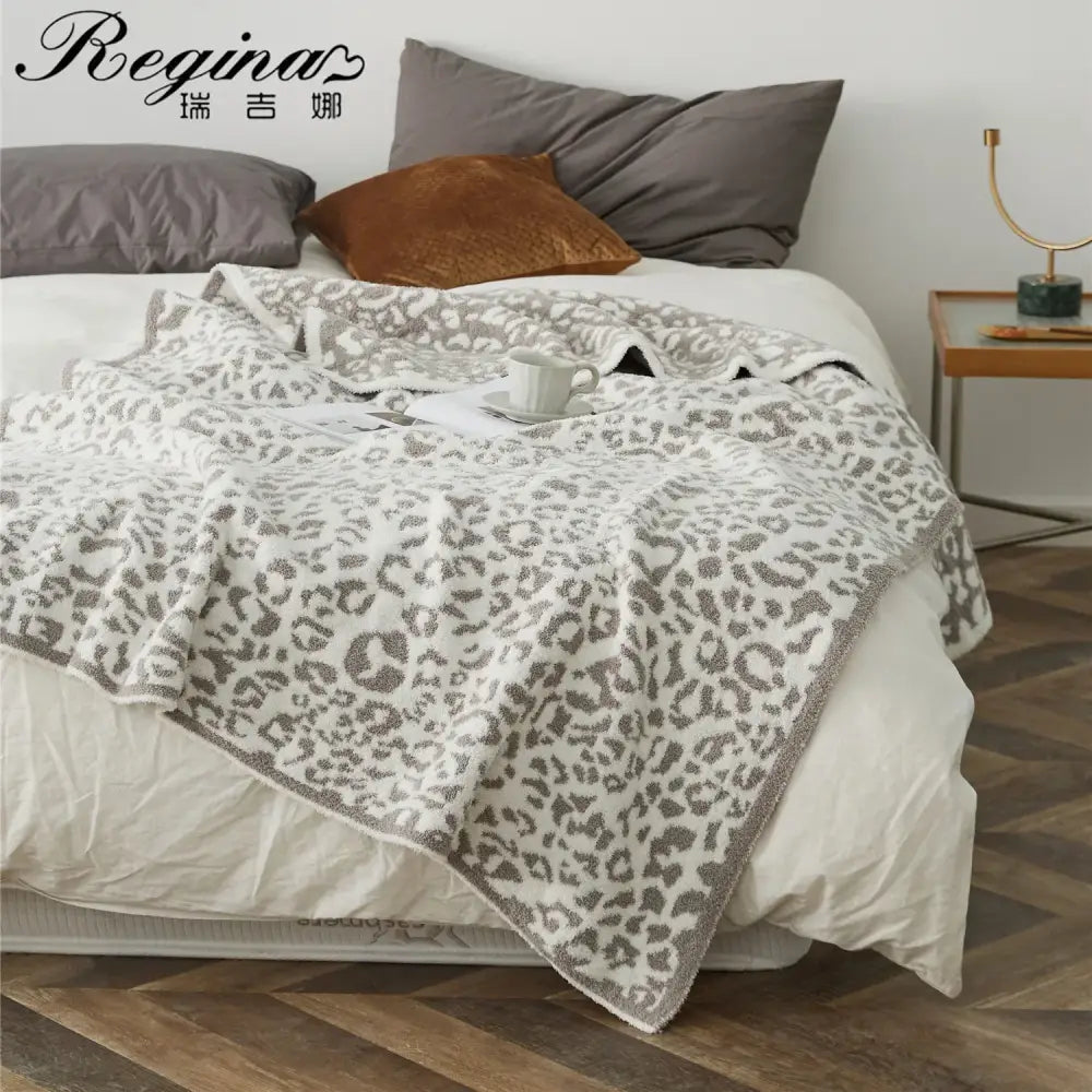 Cozy leopard print knitted cream & gray bedroom throw blanket