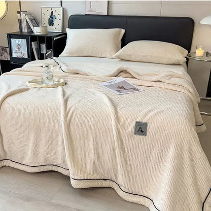 Cozy striped knitted velvet bedroom blanket in cream & black