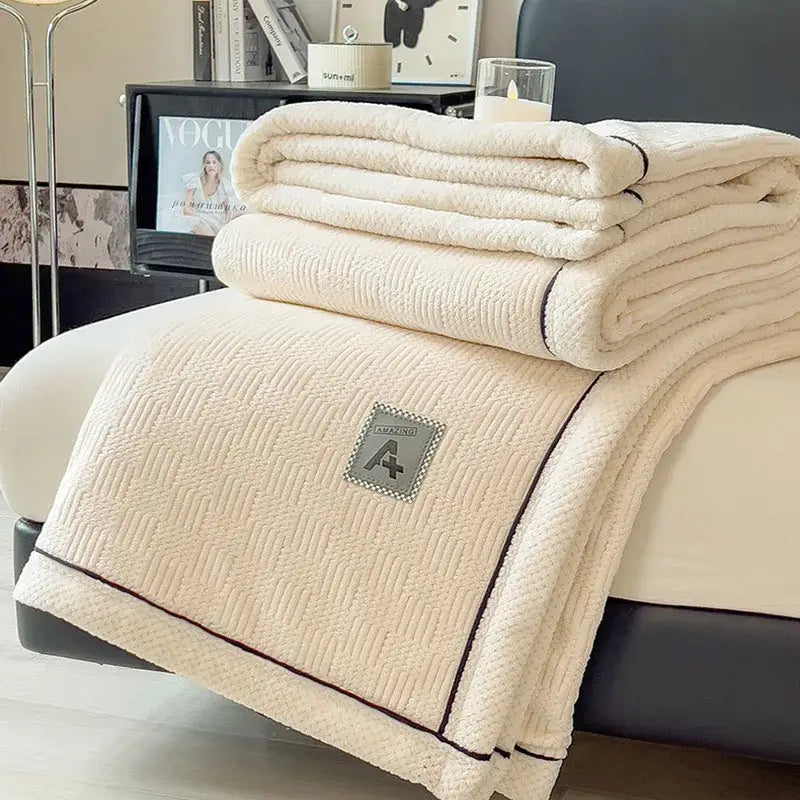 Cozy striped knitted velvet bedroom blanket in cream & black
