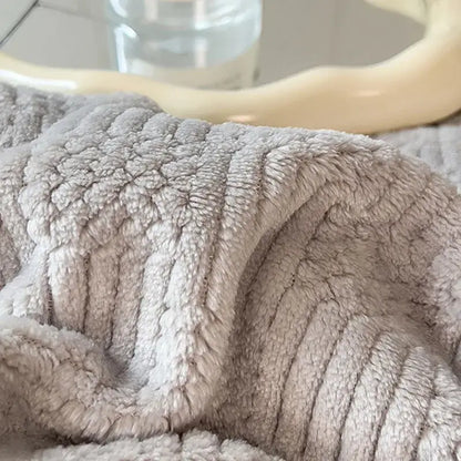 Cozy striped knitted velvet bedroom blanket in cream & black
