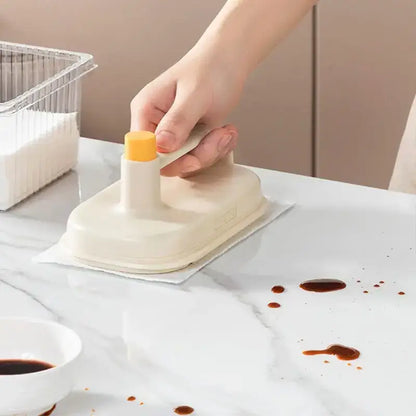 Cream and yellow silicone kitchen cleaning brush with replaceable head