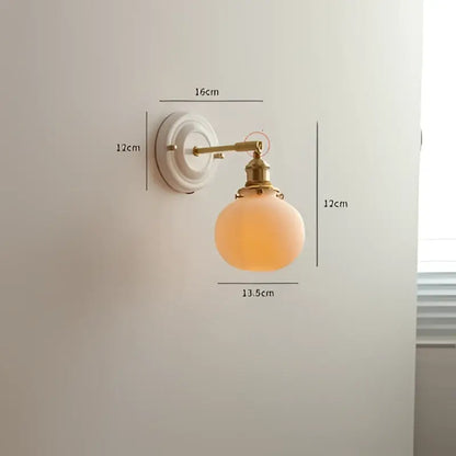 Cream ceramic led wall light with copper arm bedroom sconce