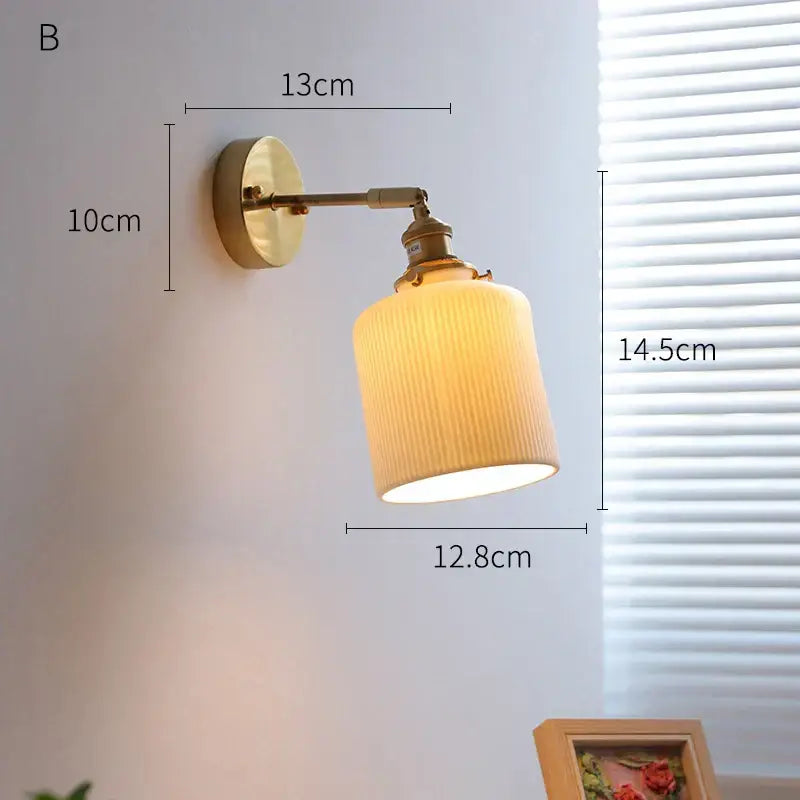 Cream ceramic led wall light with copper arm bedroom sconce