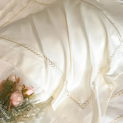 Cream embroidered ice silk bedding set for bedroom