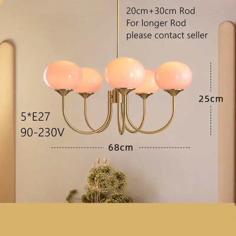Cream pink bedroom pendant light with three glass globes and brass