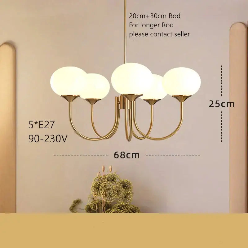 Cream pink bedroom pendant light with three glass globes and brass