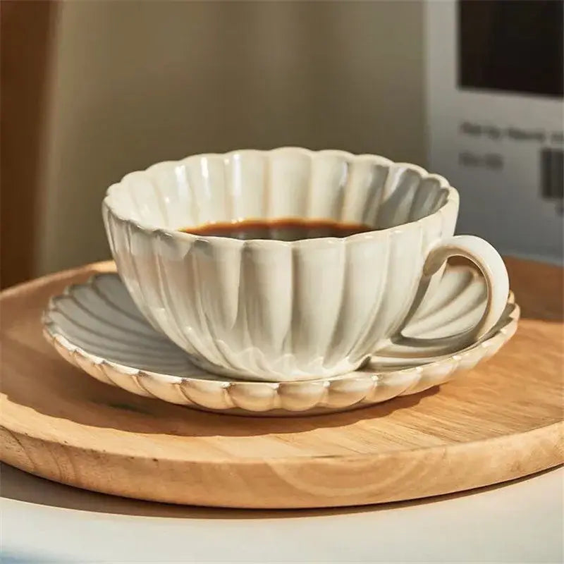 Cream scalloped ceramic afternoon tea cup and saucer dining room set