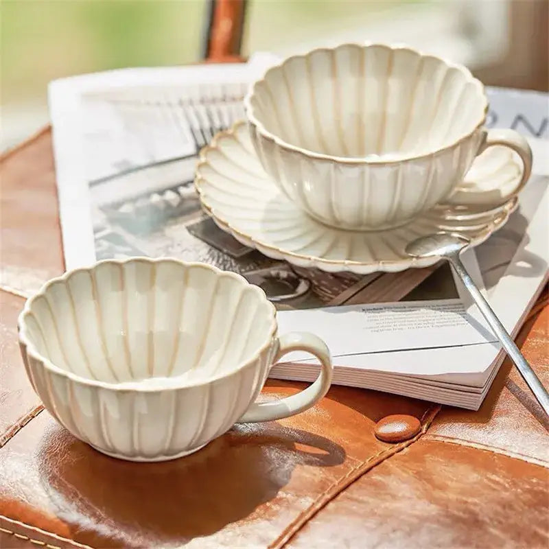 Cream scalloped ceramic afternoon tea cup and saucer dining room set