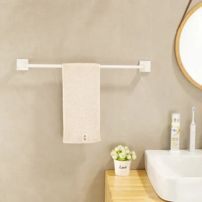 Cream white bathroom set with towel rack and storage shelf