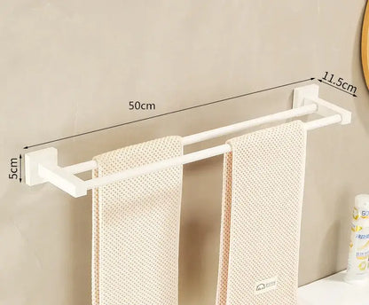 Cream white bathroom set with towel rack and storage shelf