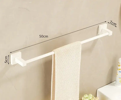 Cream white bathroom set with towel rack and storage shelf