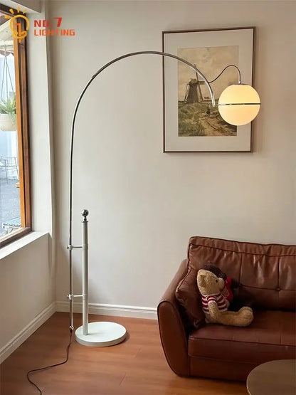 Cream wind arched floor lamp with frosted glass shade living room