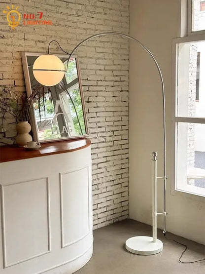 Cream wind arched floor lamp with frosted glass shade living room