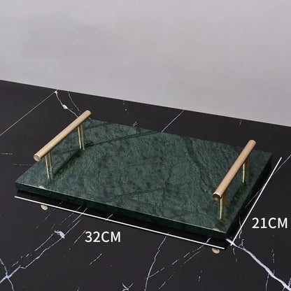 Dark green marble bathroom accessory set with gold accents