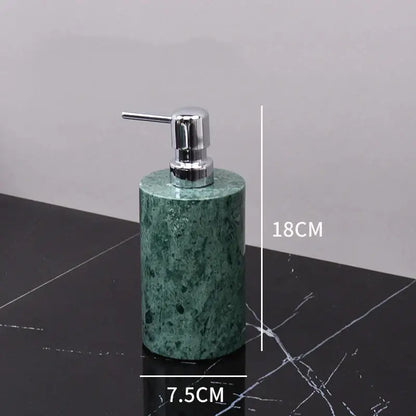 Dark green marble bathroom accessory set with gold accents