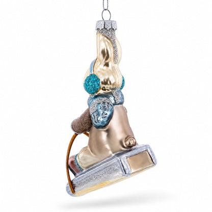 Bunny Sledding with Earmuffs Glass Christmas Ornament