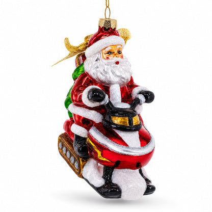 Santa Delivering Gifts on a Snowmobile Glass Christmas Ornament