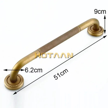 Decorative brass bathroom safety grab bar with rope detail for toilet