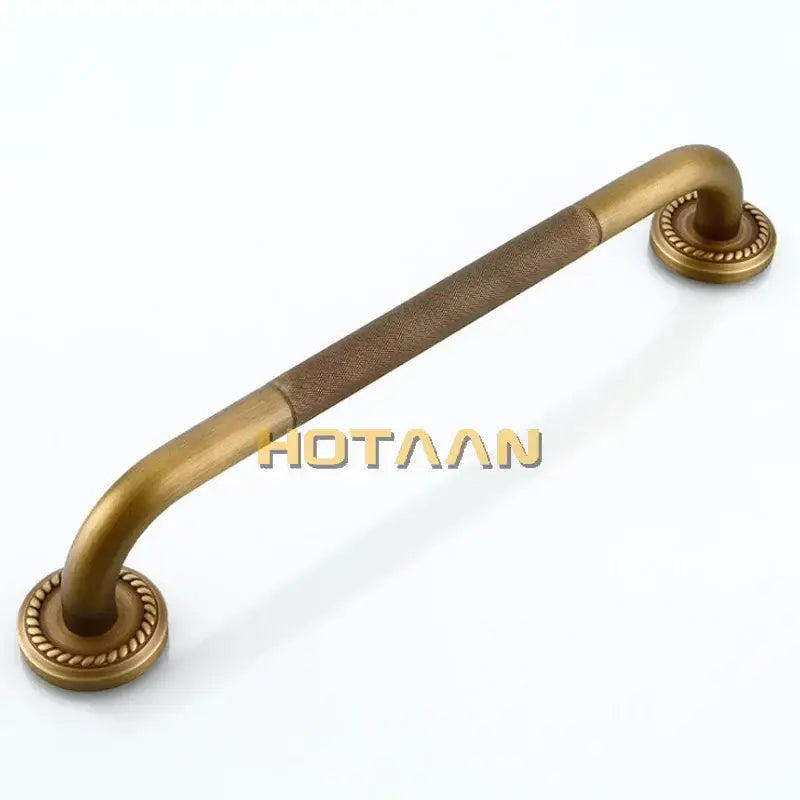 Decorative brass bathroom safety grab bar with rope detail for toilet
