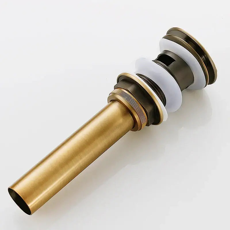 Decorative tree motif gold brass pop up drain bathroom sink