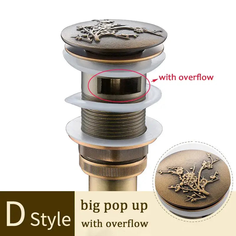 Decorative tree motif gold brass pop up drain bathroom sink