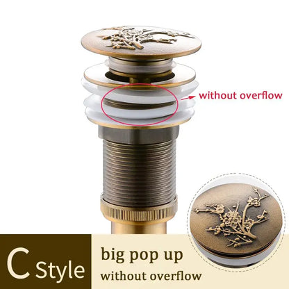 Decorative tree motif gold brass pop up drain bathroom sink