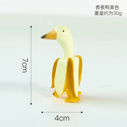Whimsical white & yellow abstract banana duck sculpture living room decor