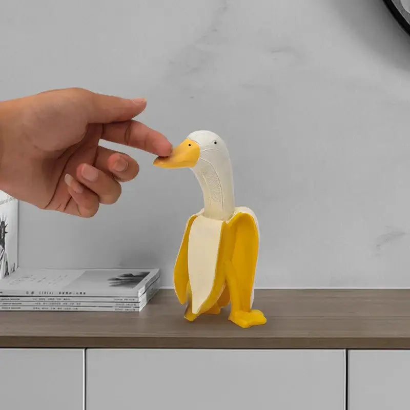 Whimsical white & yellow abstract banana duck sculpture living room decor