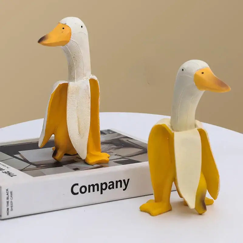 Whimsical white & yellow abstract banana duck sculpture living room decor