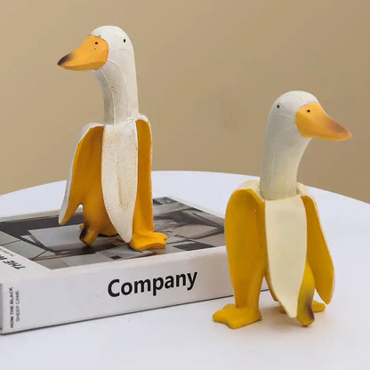 Whimsical white & yellow abstract banana duck sculpture living room decor