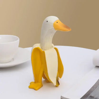 Whimsical white & yellow abstract banana duck sculpture living room decor