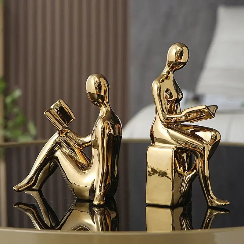 Modern glossy gold abstract figure bookend set for study room decor