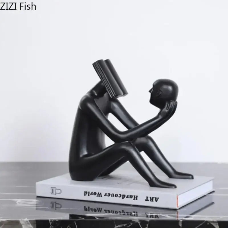 Modern black glossy abstract figure sculpture reading book bedroom decor