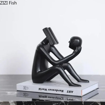 Modern black glossy abstract figure sculpture reading book bedroom decor